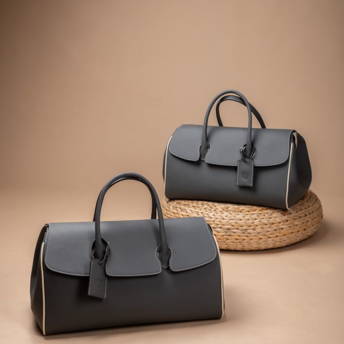 Handcrafted leather luggage set for Morgan roadster, featuring two bespoke travel bags designed to fit behind the seats