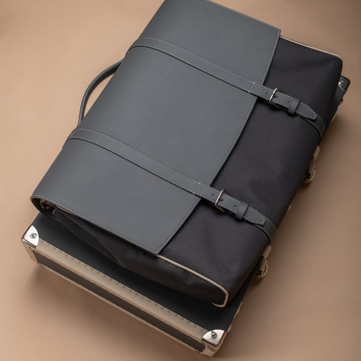 Luxury leather Voyager bag mounted on Morgan rear luggage rack suitcase